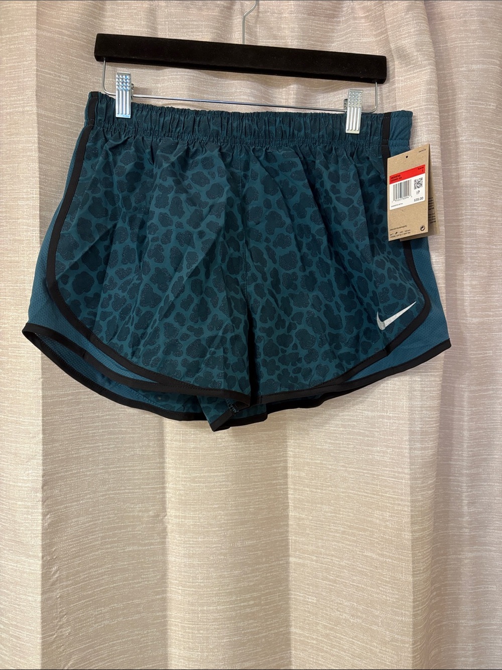 Nike Women's Teal Leopard-Print Athletic Shorts